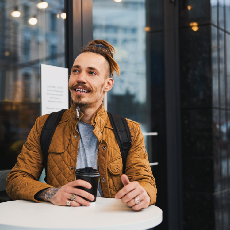 Someone is enjoying a cup of coffee at a café.